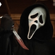 Ghostface with a bloody knife.